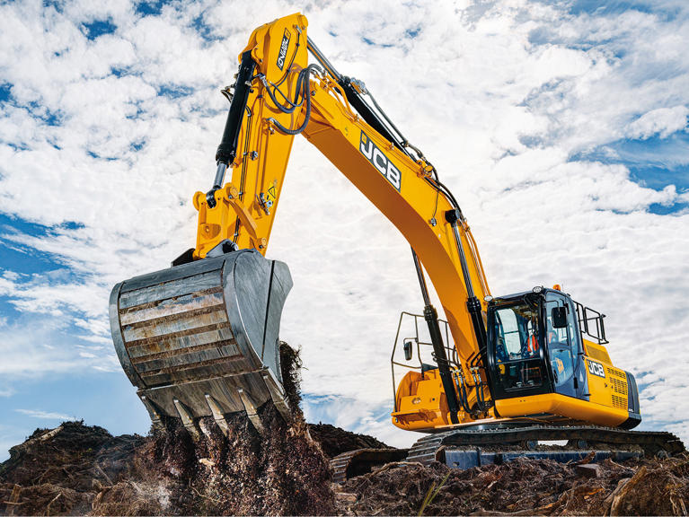 JS130 working with a bucket attachment